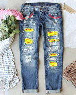 SOFTBALL RIPPED JEANS